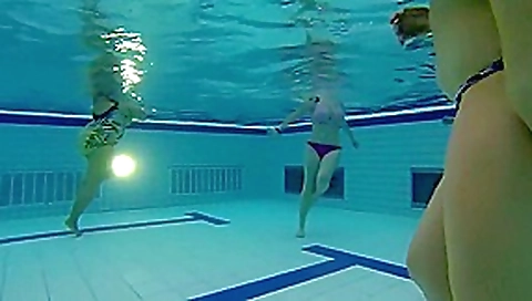 Underwater handjob