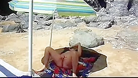 French mature masturbates at the beach French mature masturbates at the beach