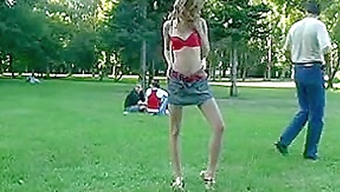 Young cutie pulls off red bra in the public Young cutie pulls off red bra in the public