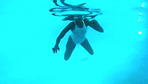 See-through white swimsuit in public pool See-through white swimsuit in public pool