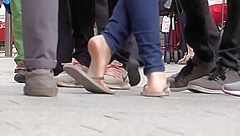 Candid barefoot shoeplay in flip-flops Candid barefoot shoeplay in flip-flops