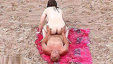 Horny matures caught at the nude beach Horny matures caught at the nude beach