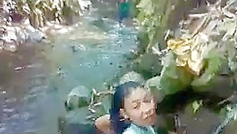 Indo malay bathing at a river Indo malay bathing at a river
