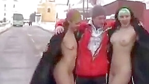 Two girls flashing in the snow Two girls flashing in the snow