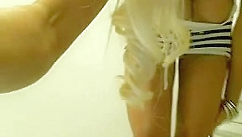 Busty blonde masturbates in public restroom on cam Busty blonde masturbates in public restroom on cam