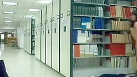 Oriental immature flashes in public library Oriental immature flashes in public library