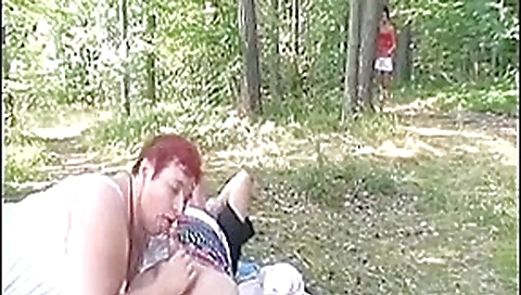 Old couple outdoor with younger woman Old couple outdoor with younger woman